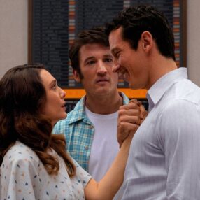 Eternity movie still with Elizabeth Olsen, Miles Teller and Callum Turner.
