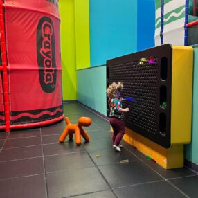 Crayola Experience playground and child.