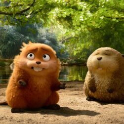 Hoppers Beavers at edge of pond.