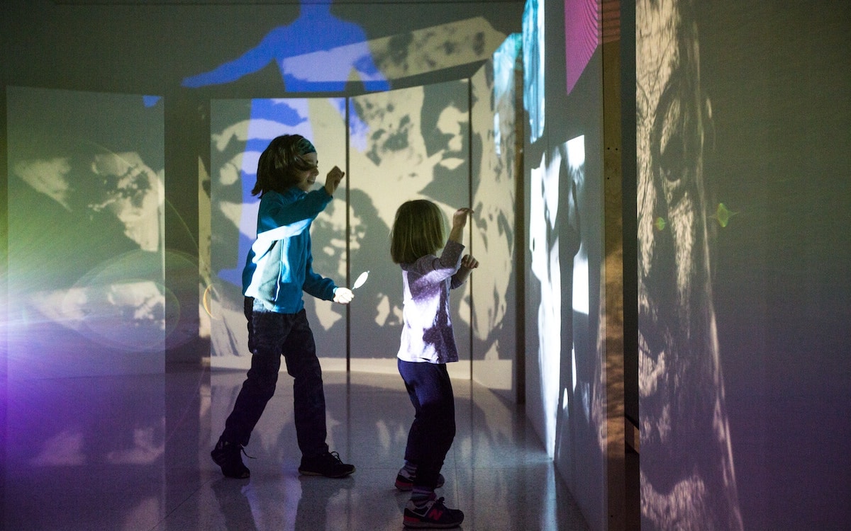 Kids watching films at the Walker.