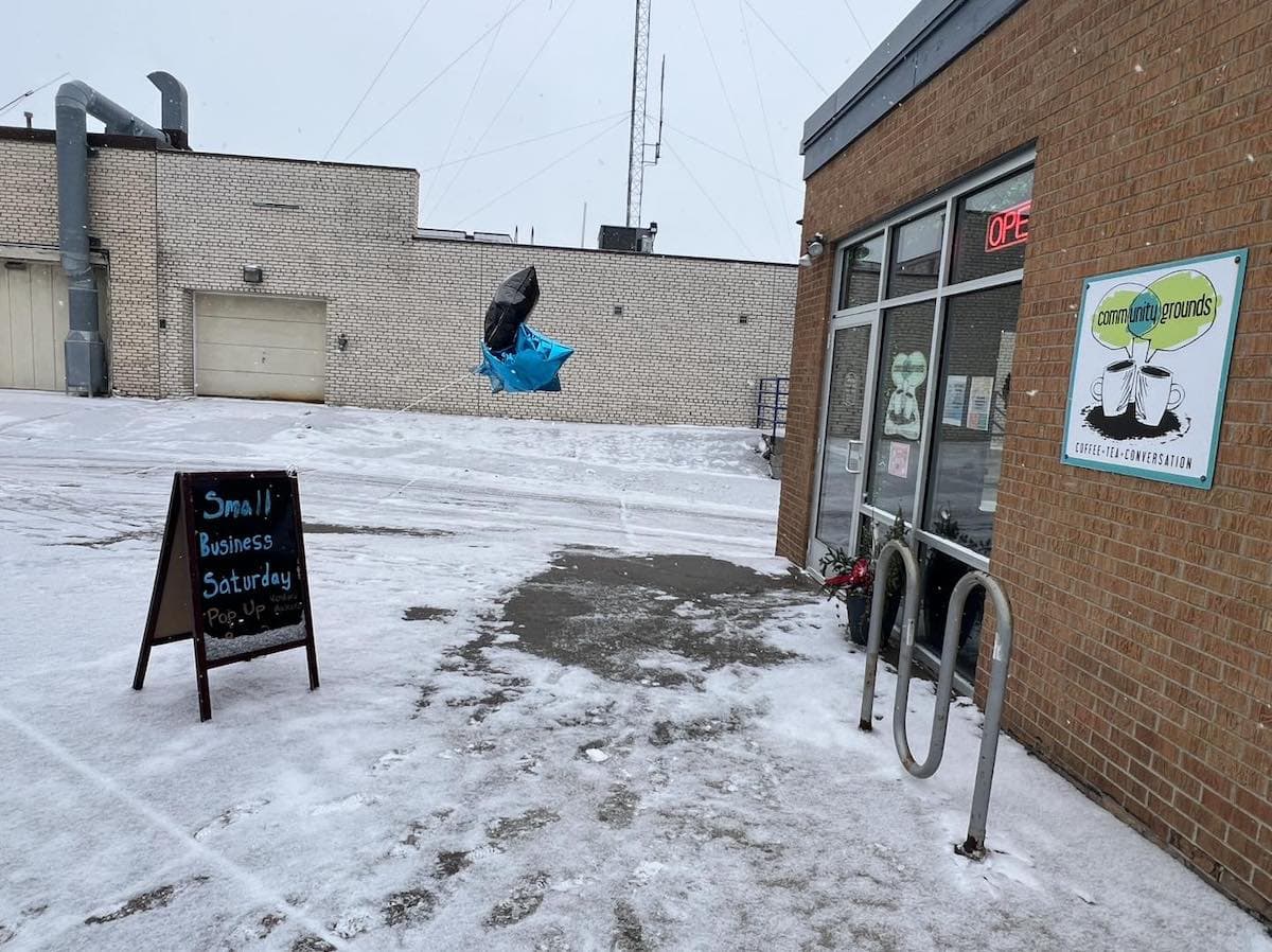 Outside of the Community Grounds coffeeshop building.