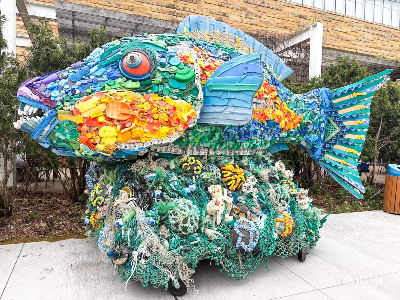 Rainbow Fish Washed Ashore Art Sculpture.