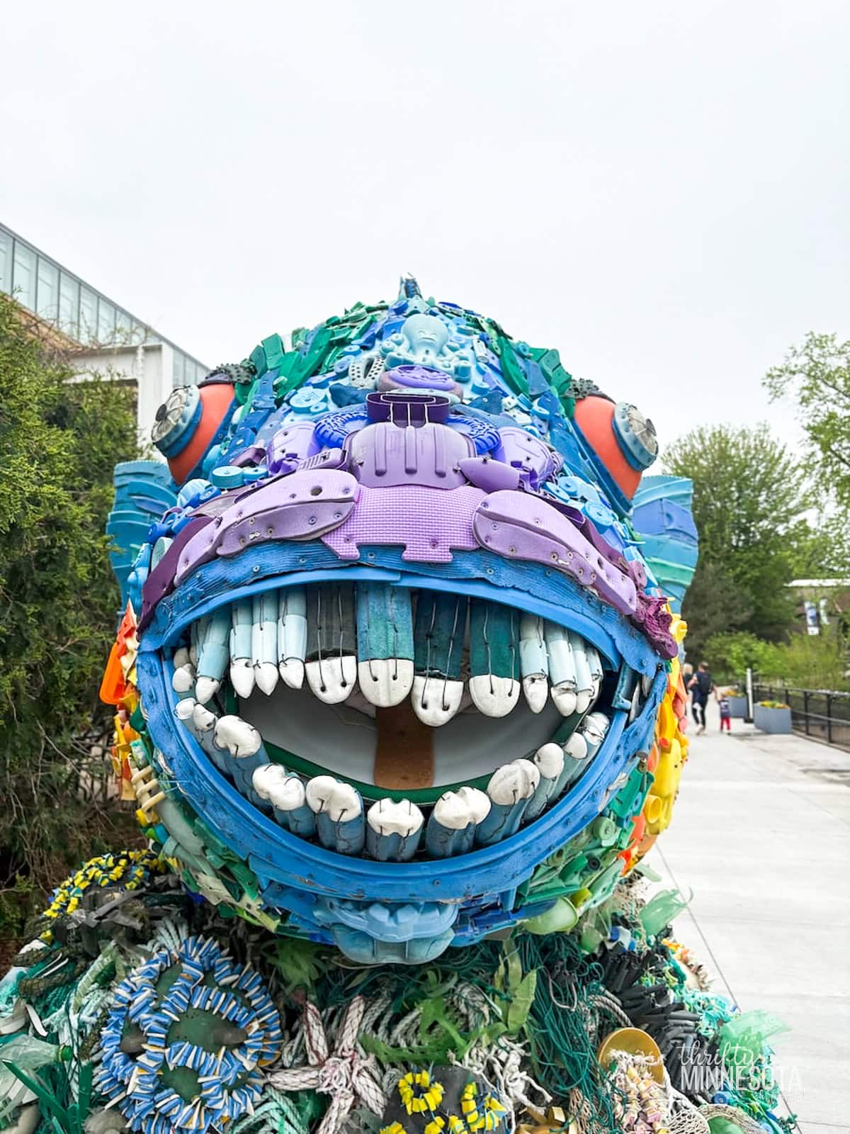 Rainbow Fish Washed Ashore Art Sculpture.