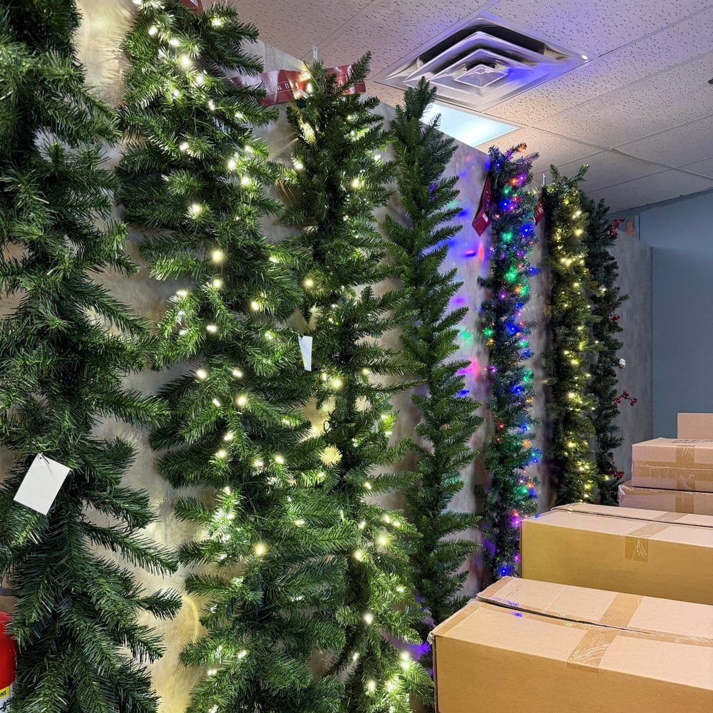 Garland hanging on wall at Vickerman Christmas Warehouse Sale.